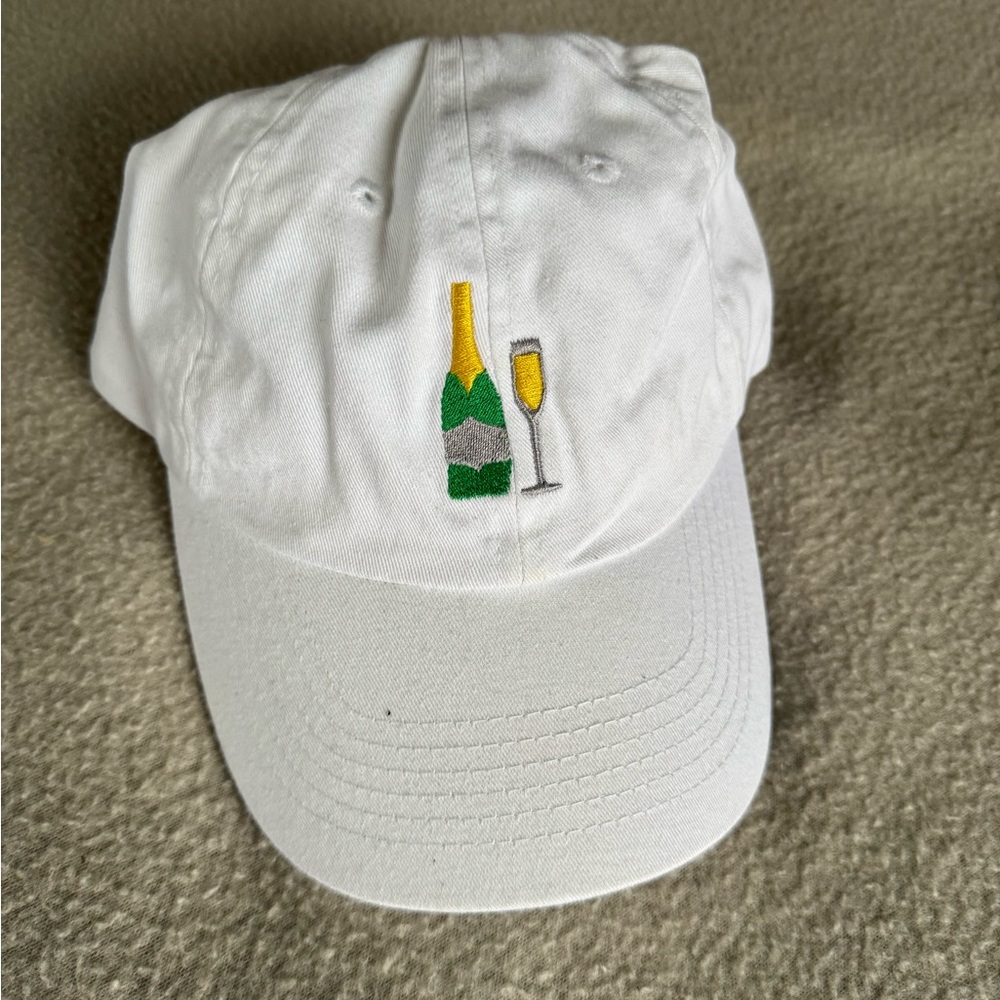Champagne bottle and glass white baseball cap